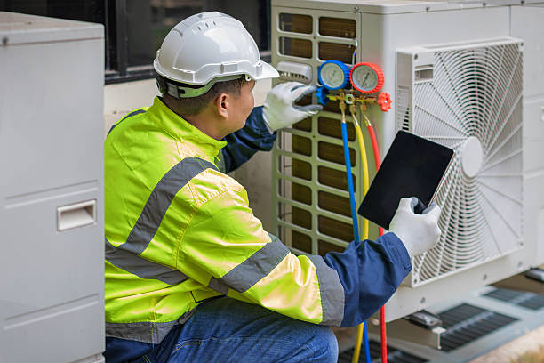 Professional Hvac technician working in Brenham, TX